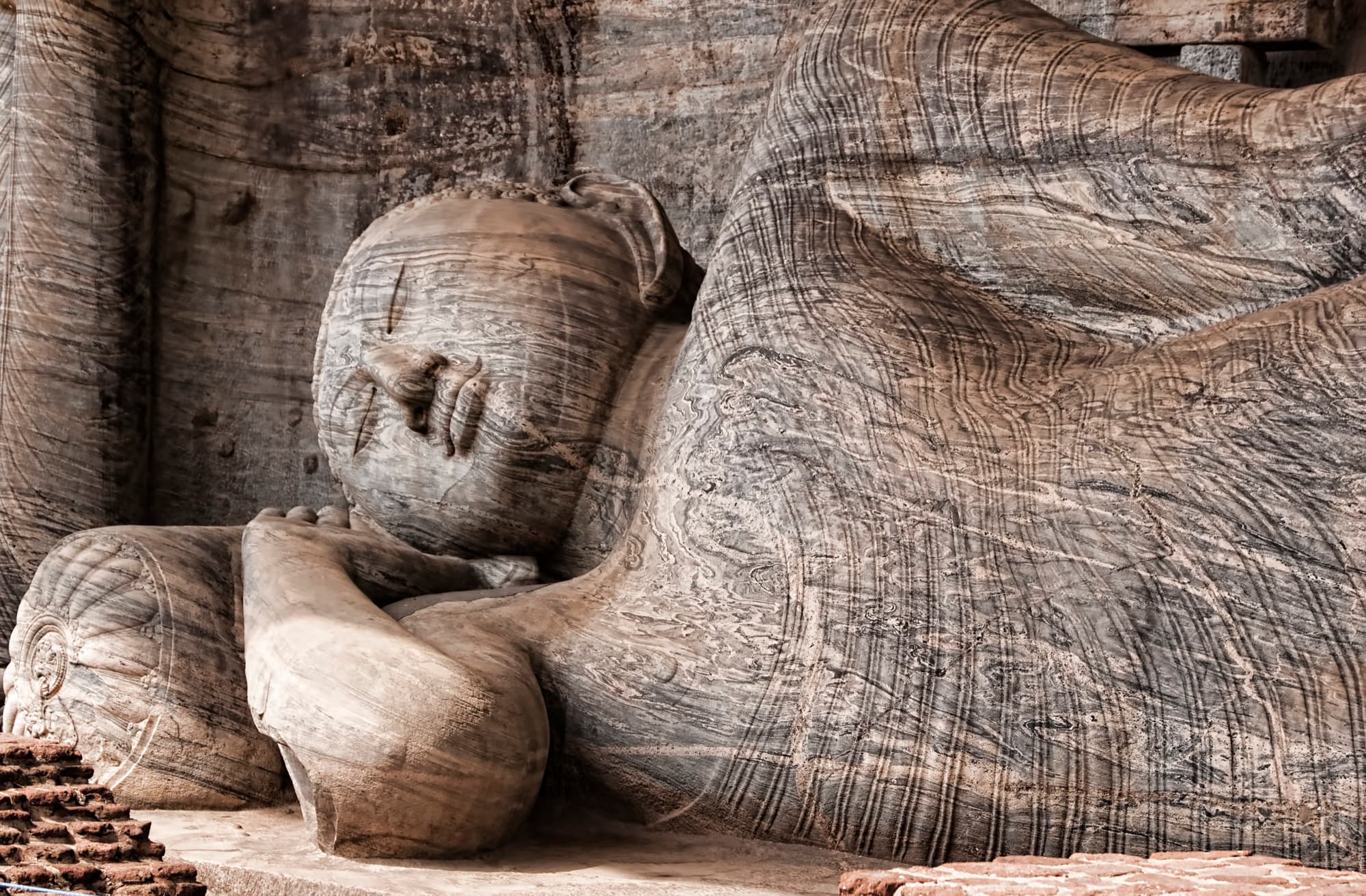 The reclining Buddha carved from granite at Gal Vihara, Polonnaruwa